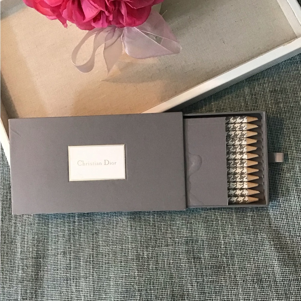 Christian Dior Gray Pencil Sketchbook Collection. Has few beautiful sketches.